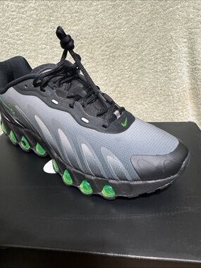 Nike Black and Gray Athletic Shoe with Neon Green Pods